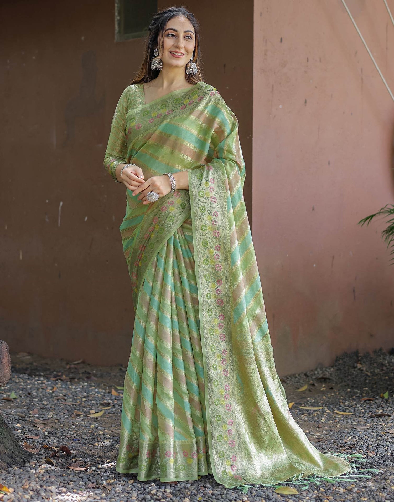 Pista Green Silk Woven Saree