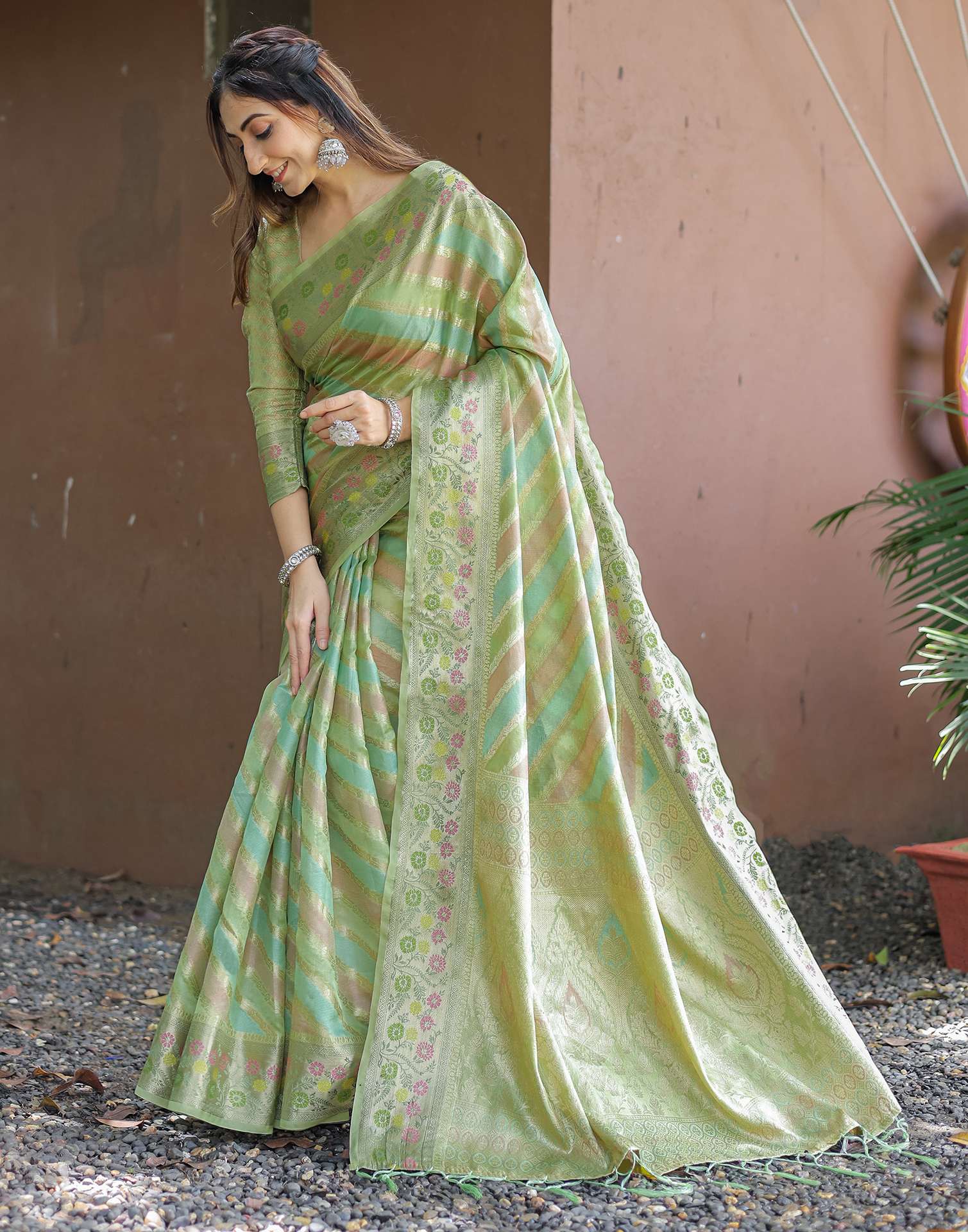 Pista Green Silk Woven Saree