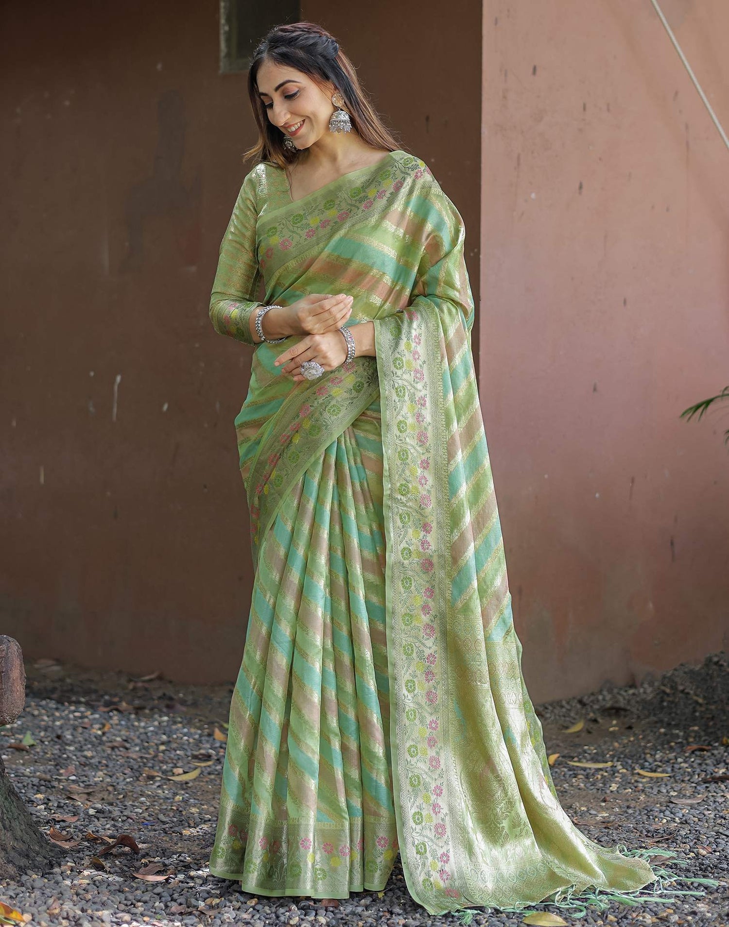 Pista Green Silk Woven Saree