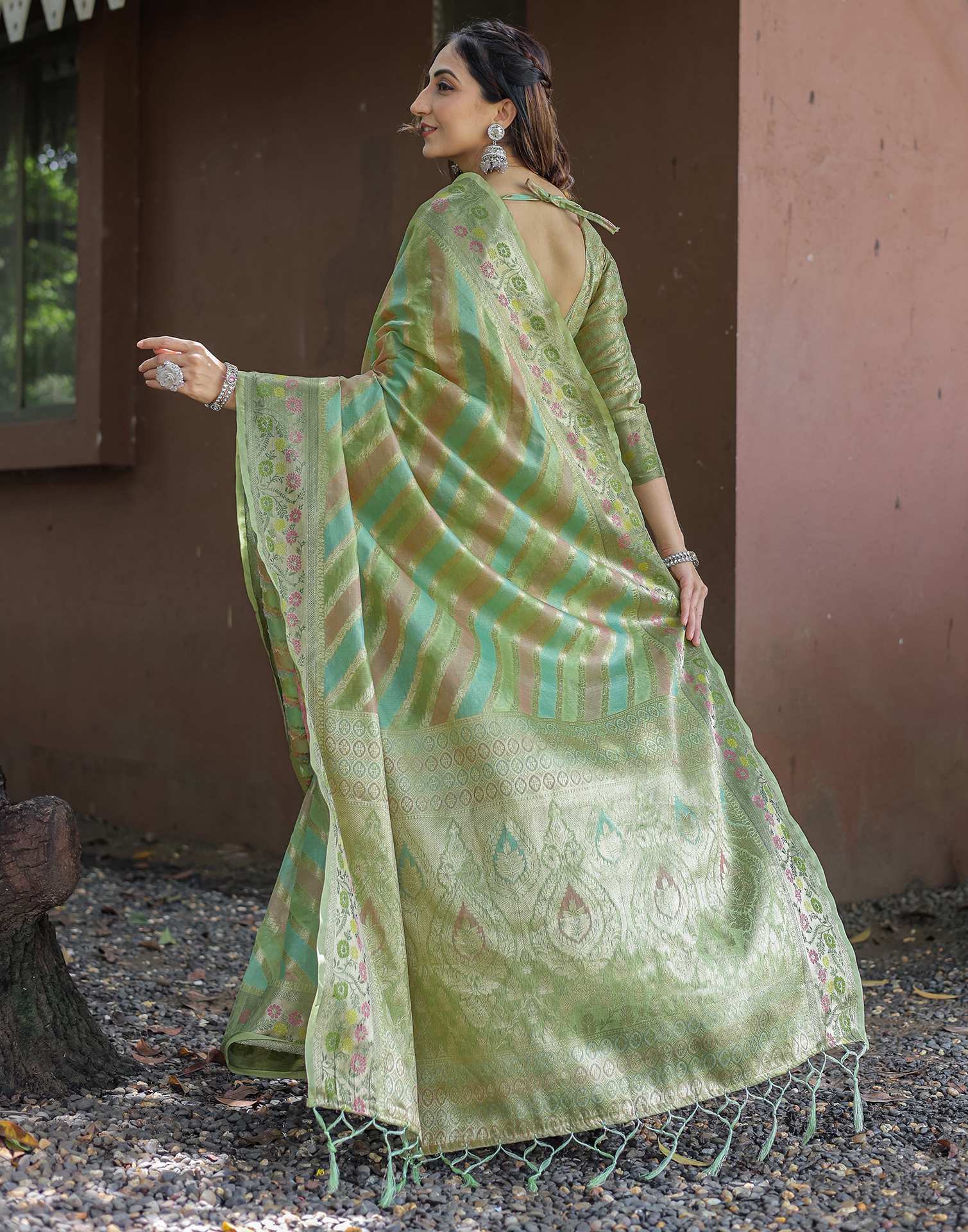 Pista Green Silk Woven Saree