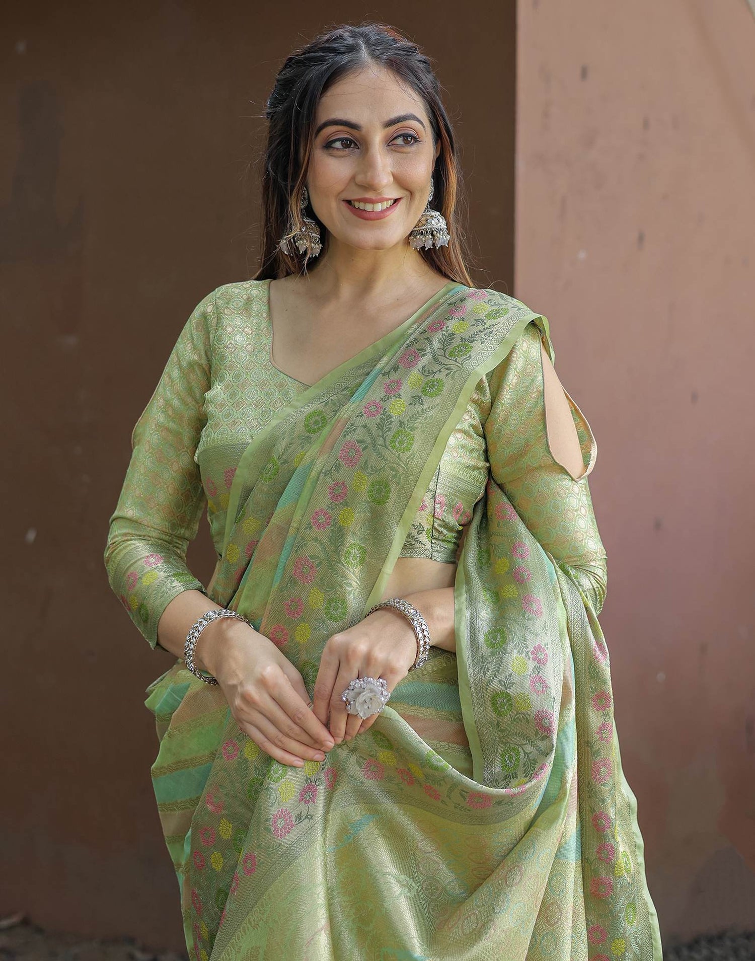 Pista Green Silk Woven Saree