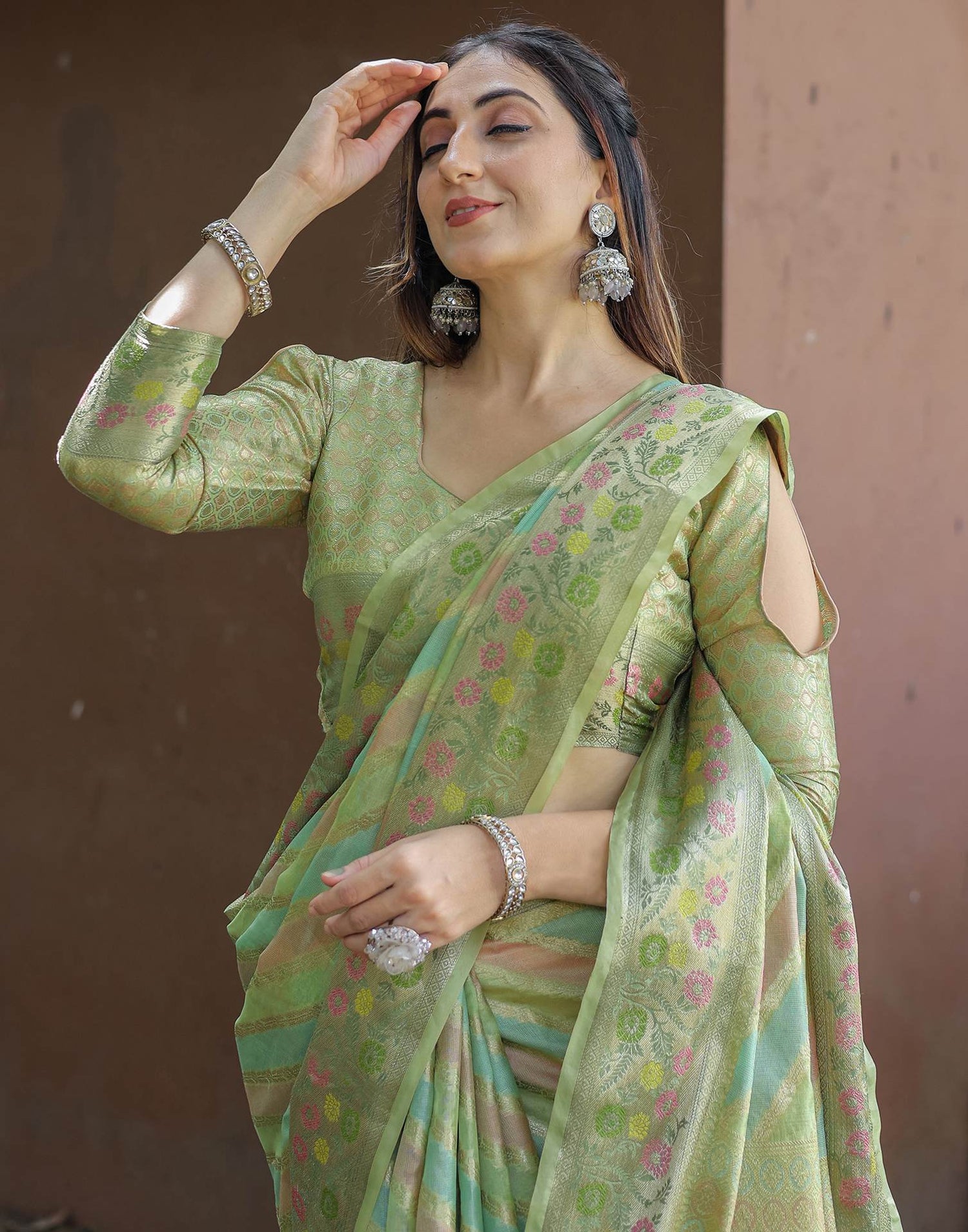 Pista Green Silk Woven Saree
