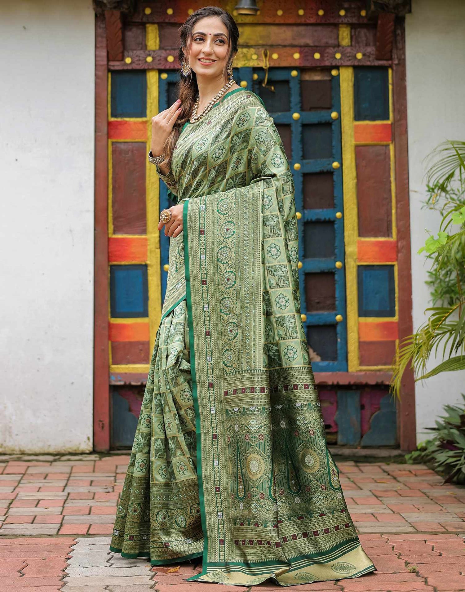 Pista Green Silk Woven Saree