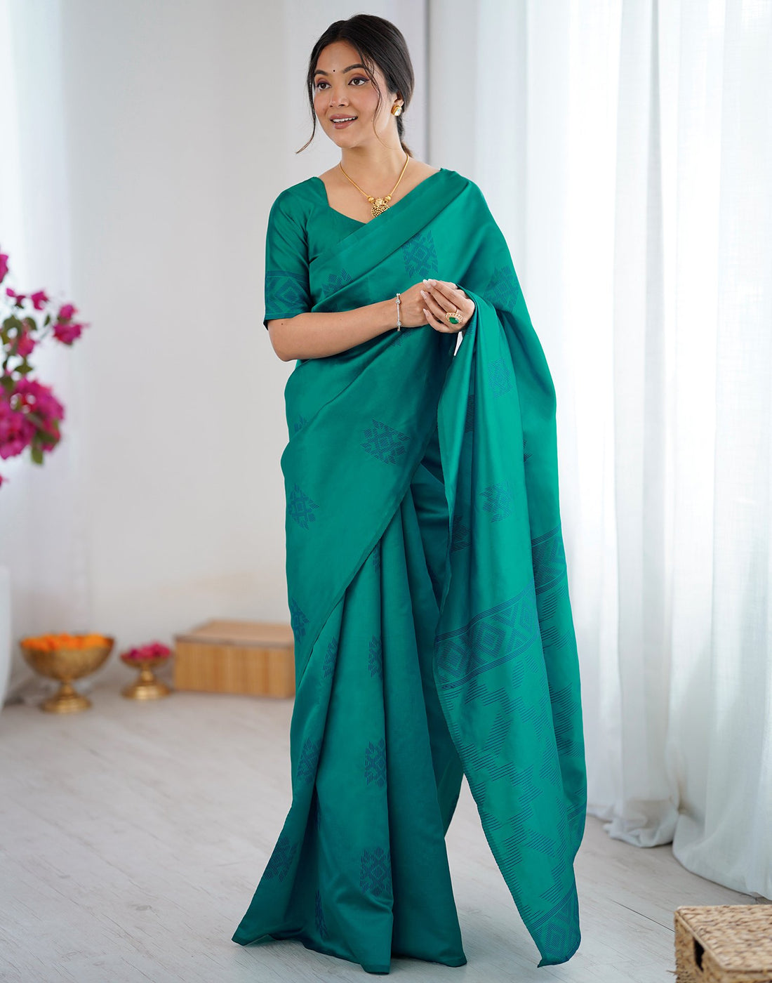 Teal Green Silk Woven Saree