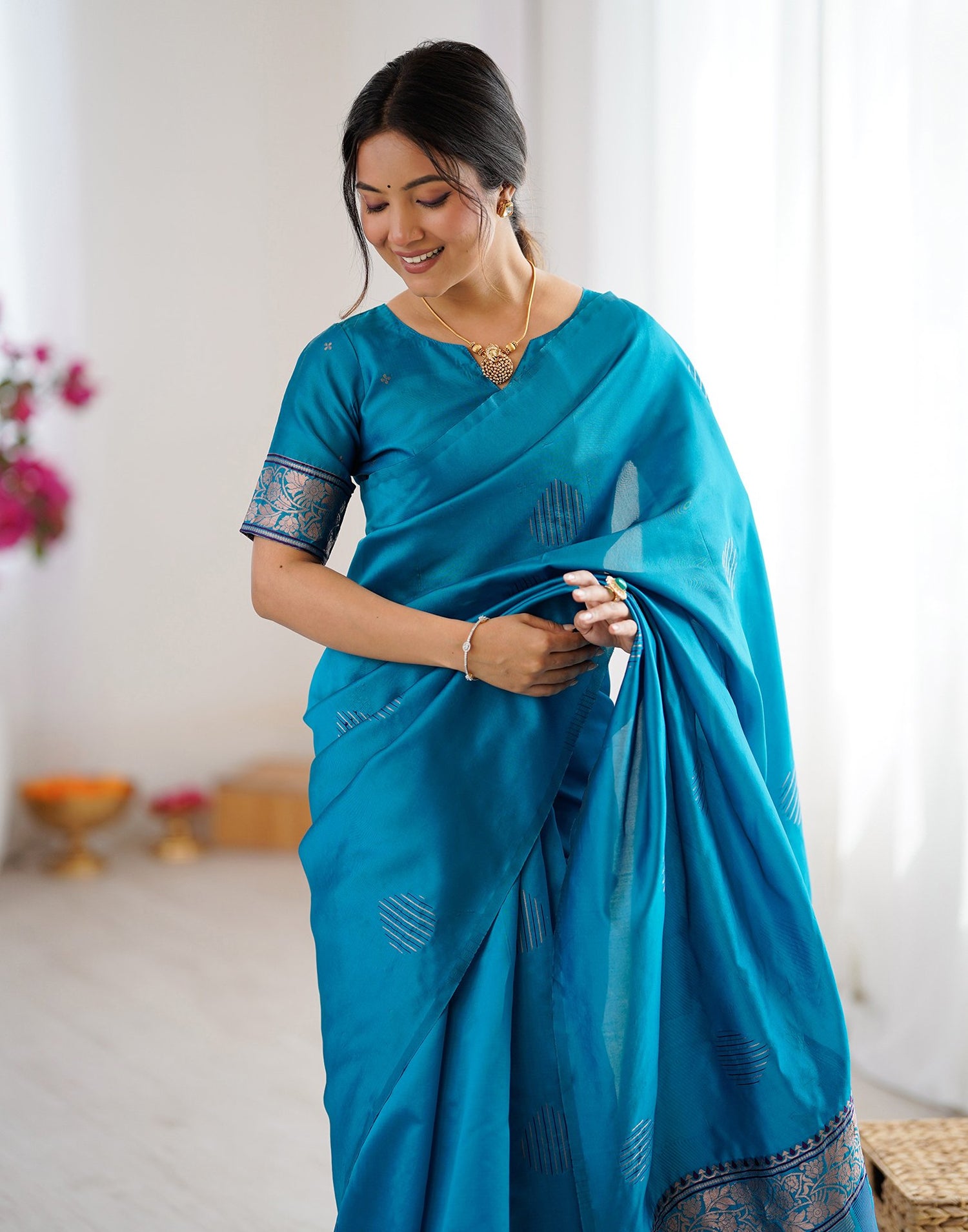Teal Blue Silk Woven Saree