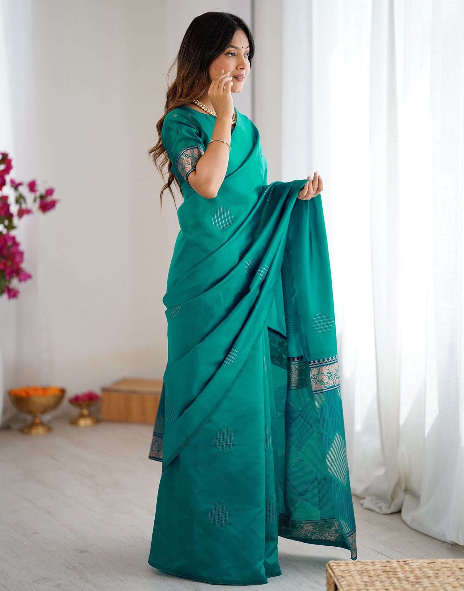 Teal Green Silk Woven Saree