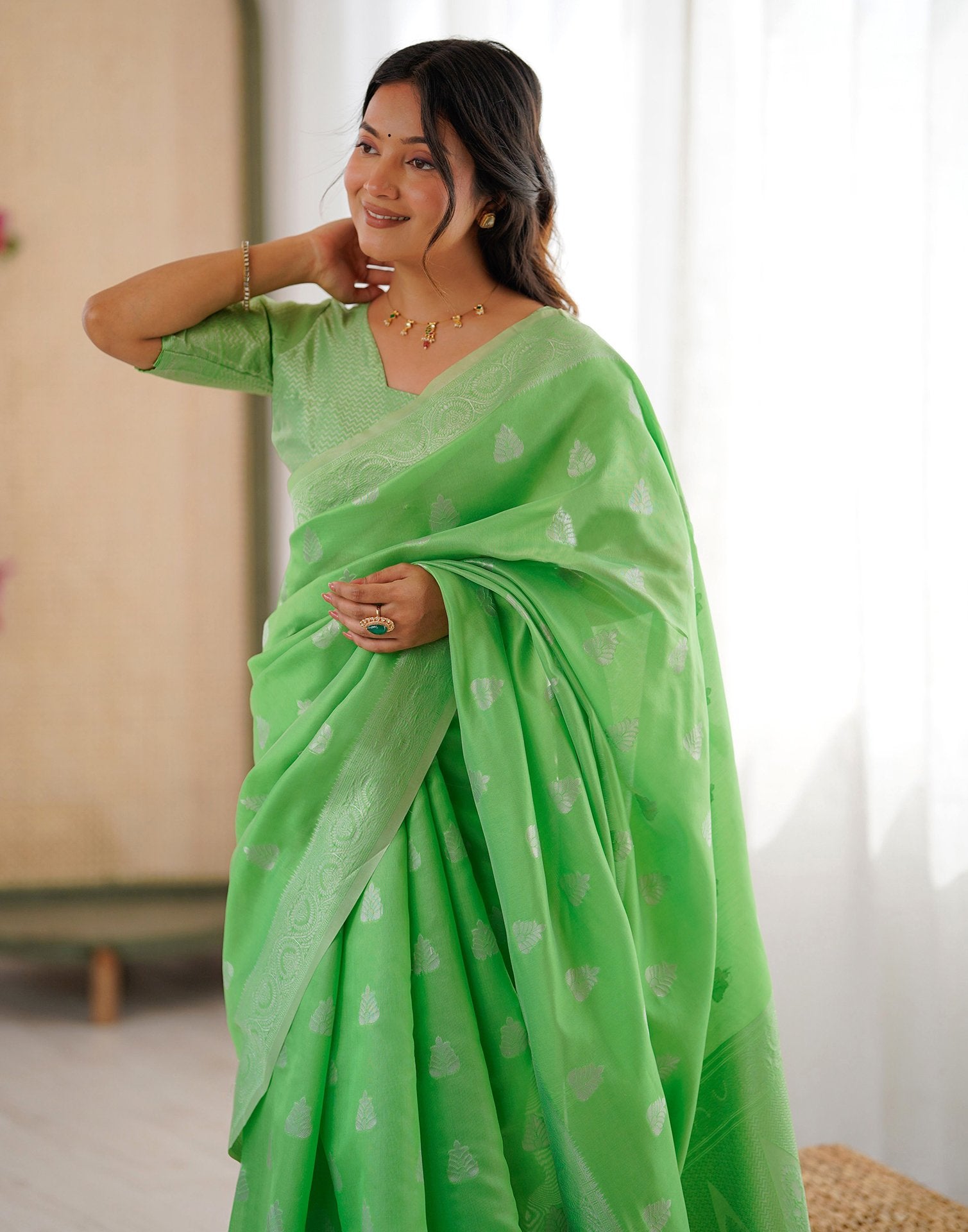 Parrot Green Silk Woven Saree