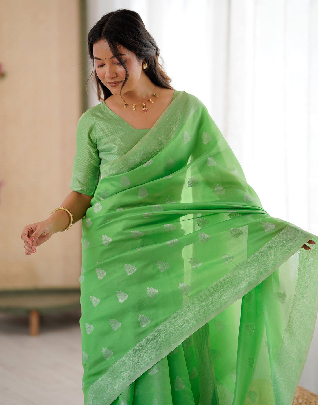 Parrot Green Silk Woven Saree