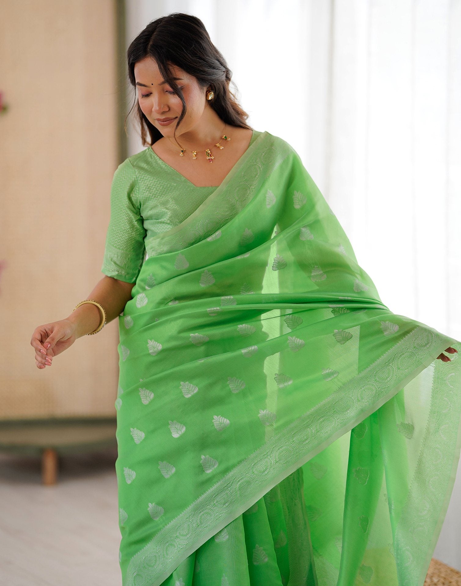 Parrot Green Silk Woven Saree