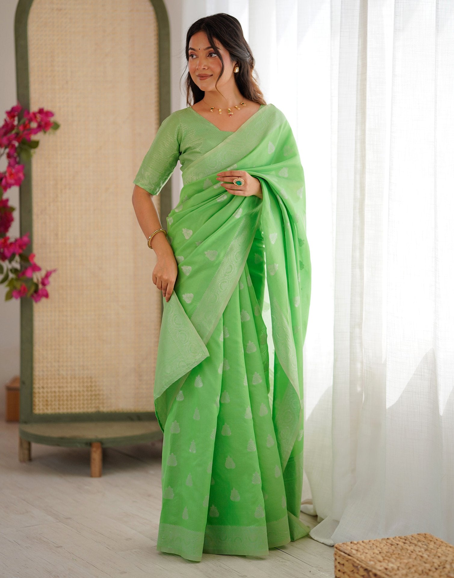 Parrot Green Silk Woven Saree