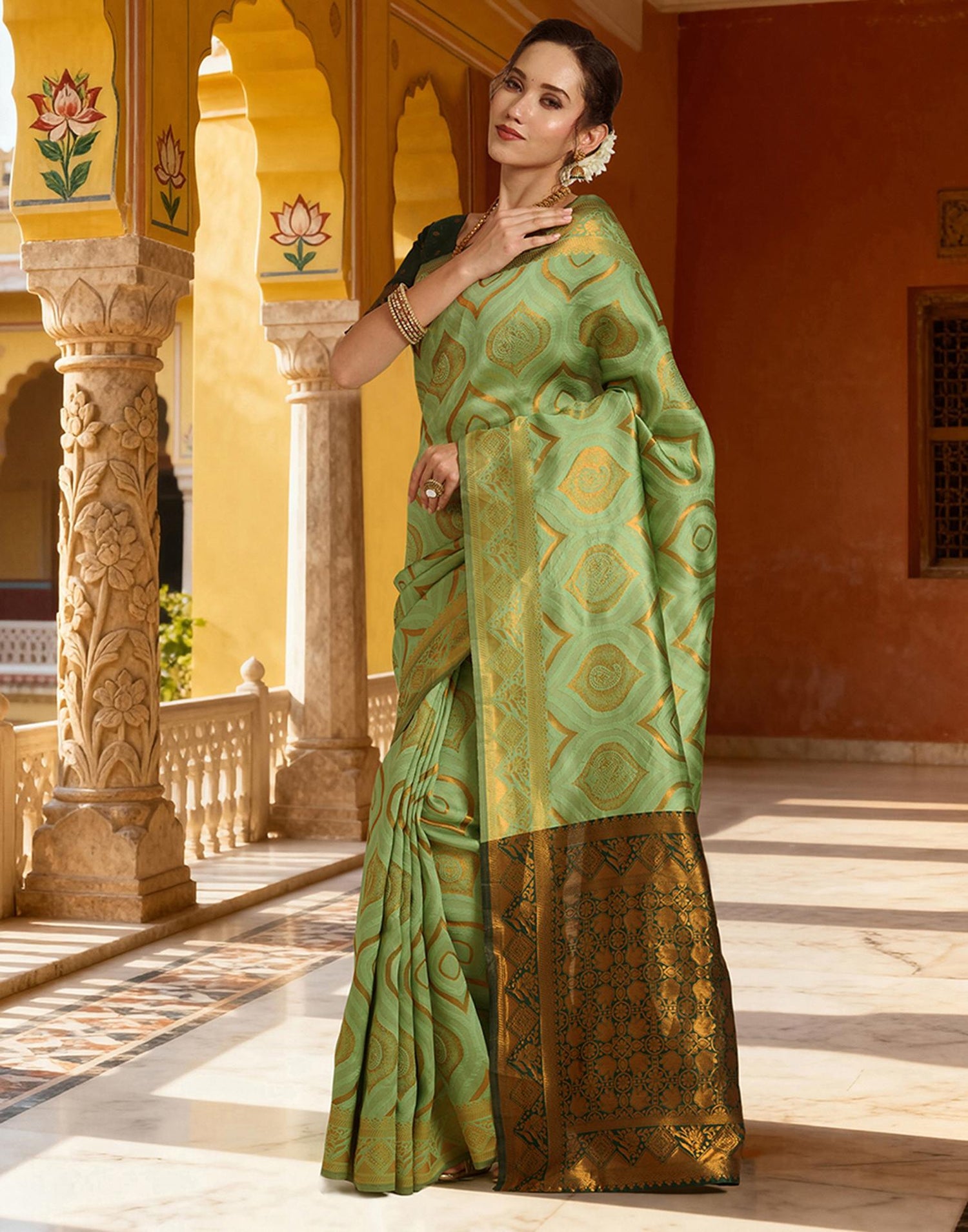 Pista Green Silk Woven Saree