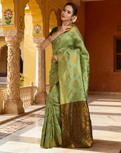 Pista Green Silk Woven Saree