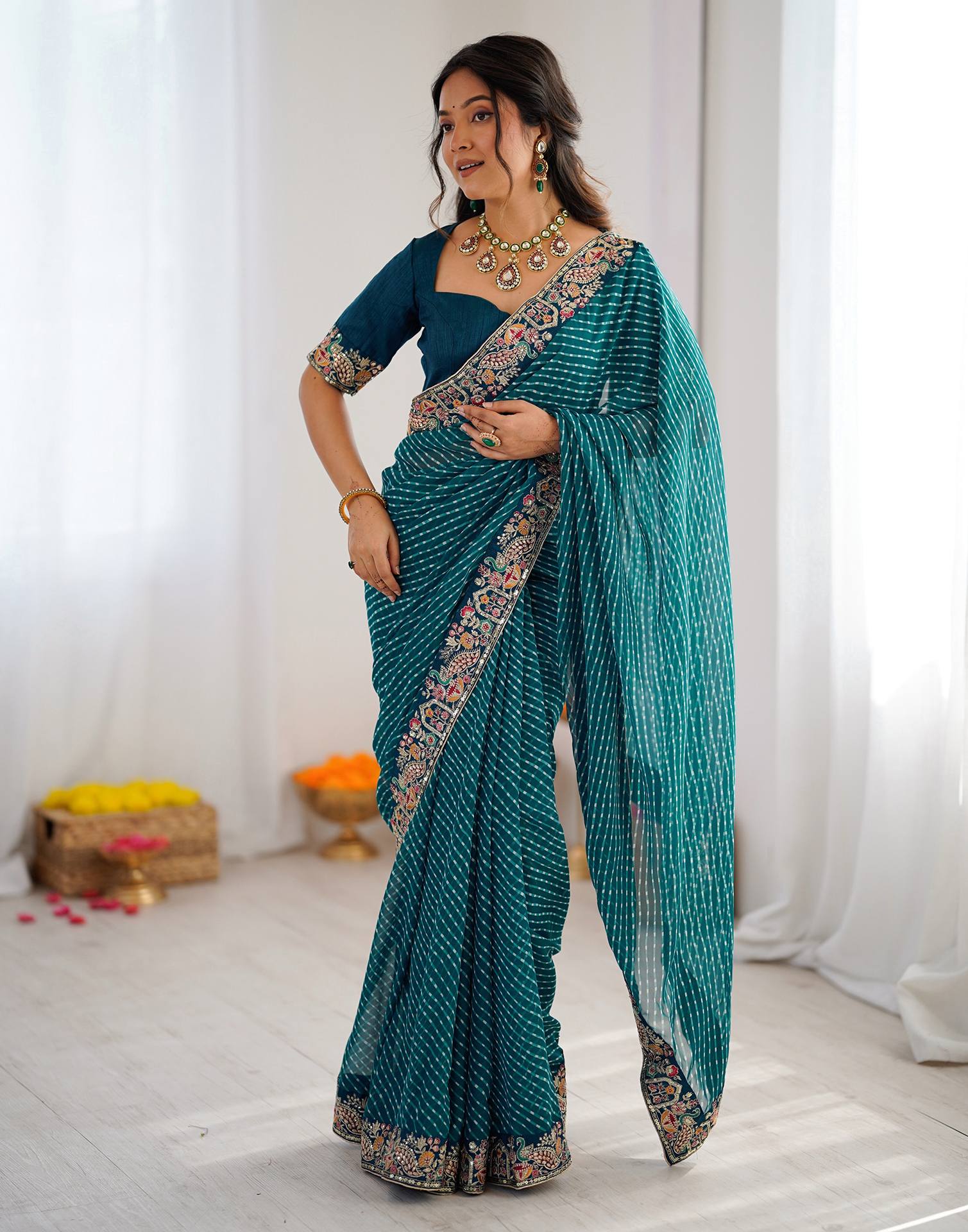 Teal Blue Georgette Printed Laheriya Saree