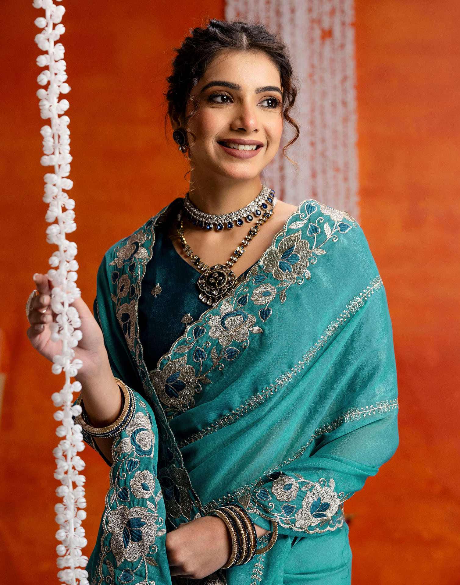 Teal Blue Shimmer Embroidery Saree