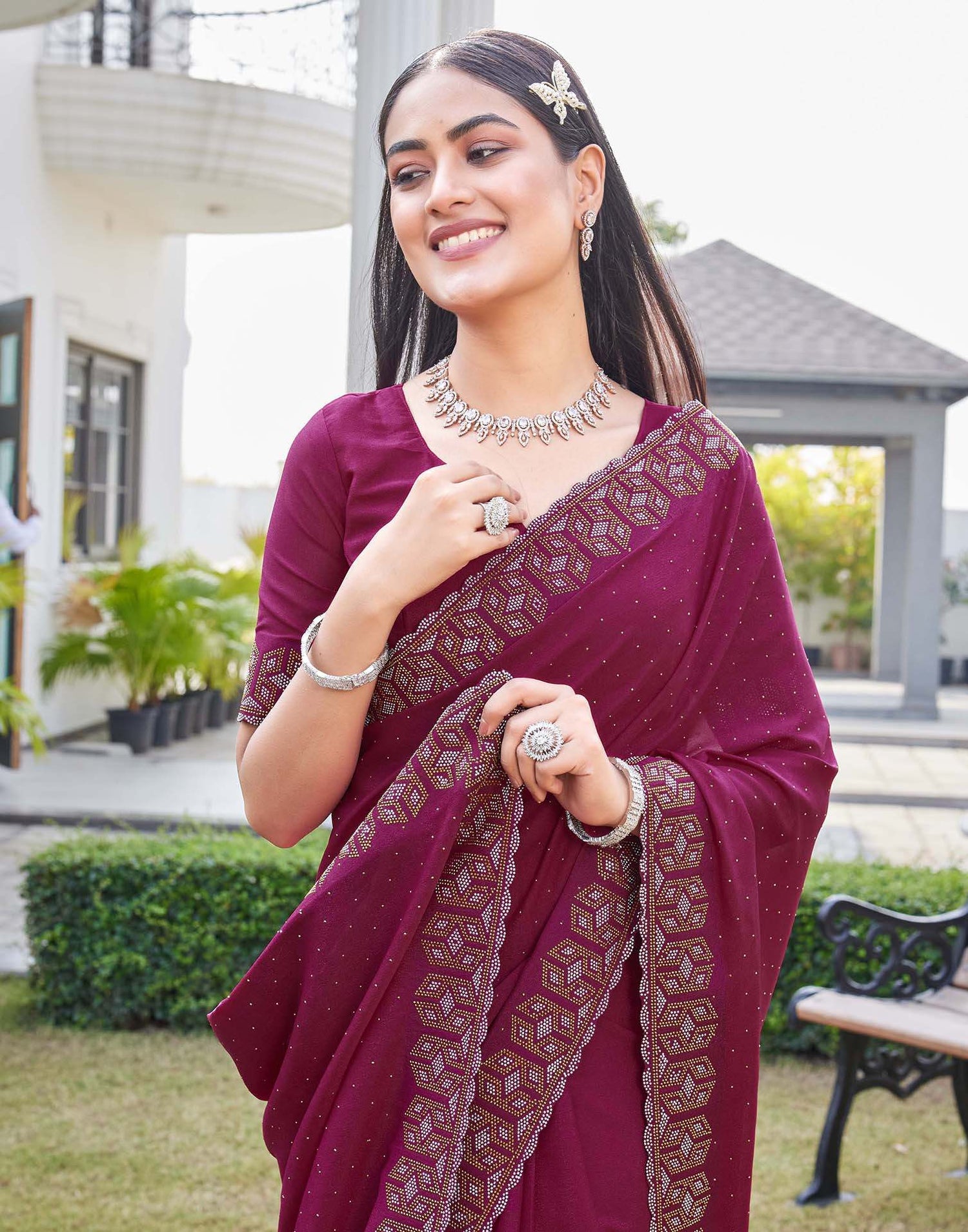 Rani Pink Georgette Stone Work Embellished Saree