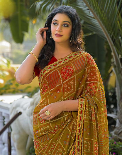 Dusty Brown Georgette Bandhani Printed Lace Saree