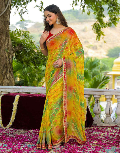 Yellow Georgette Bandhani Printed Lace Saree