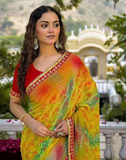 Yellow Georgette Bandhani Printed Lace Saree
