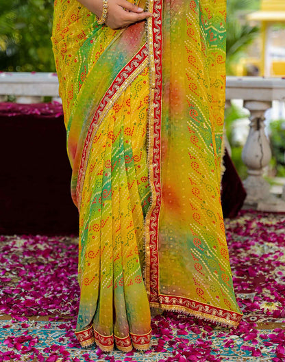 Yellow Georgette Bandhani Printed Lace Saree