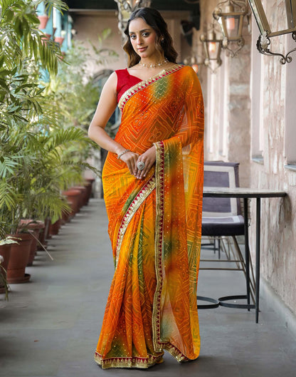 Orange Georgette Bandhani Printed Lace Saree