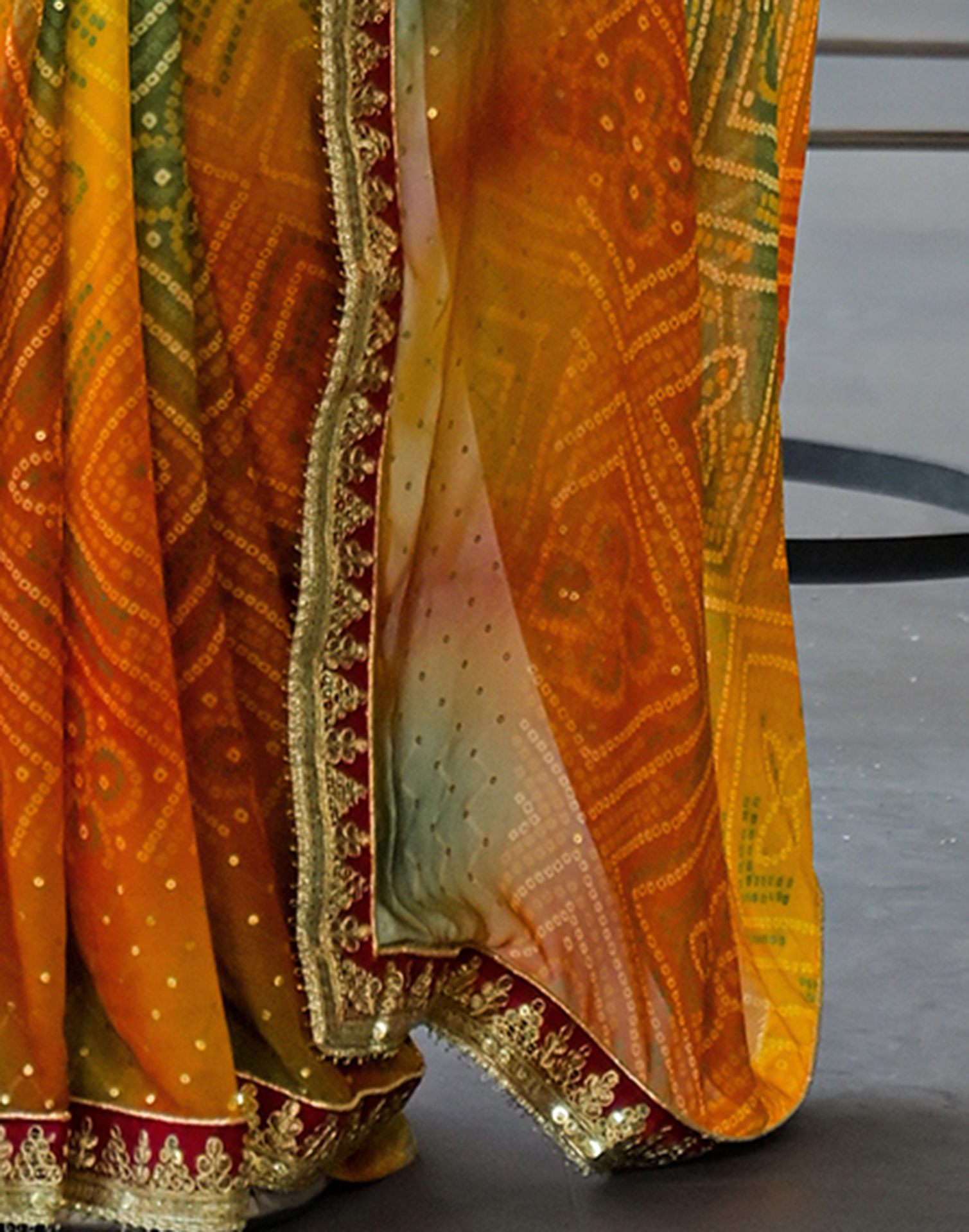 Orange Georgette Bandhani Printed Lace Saree