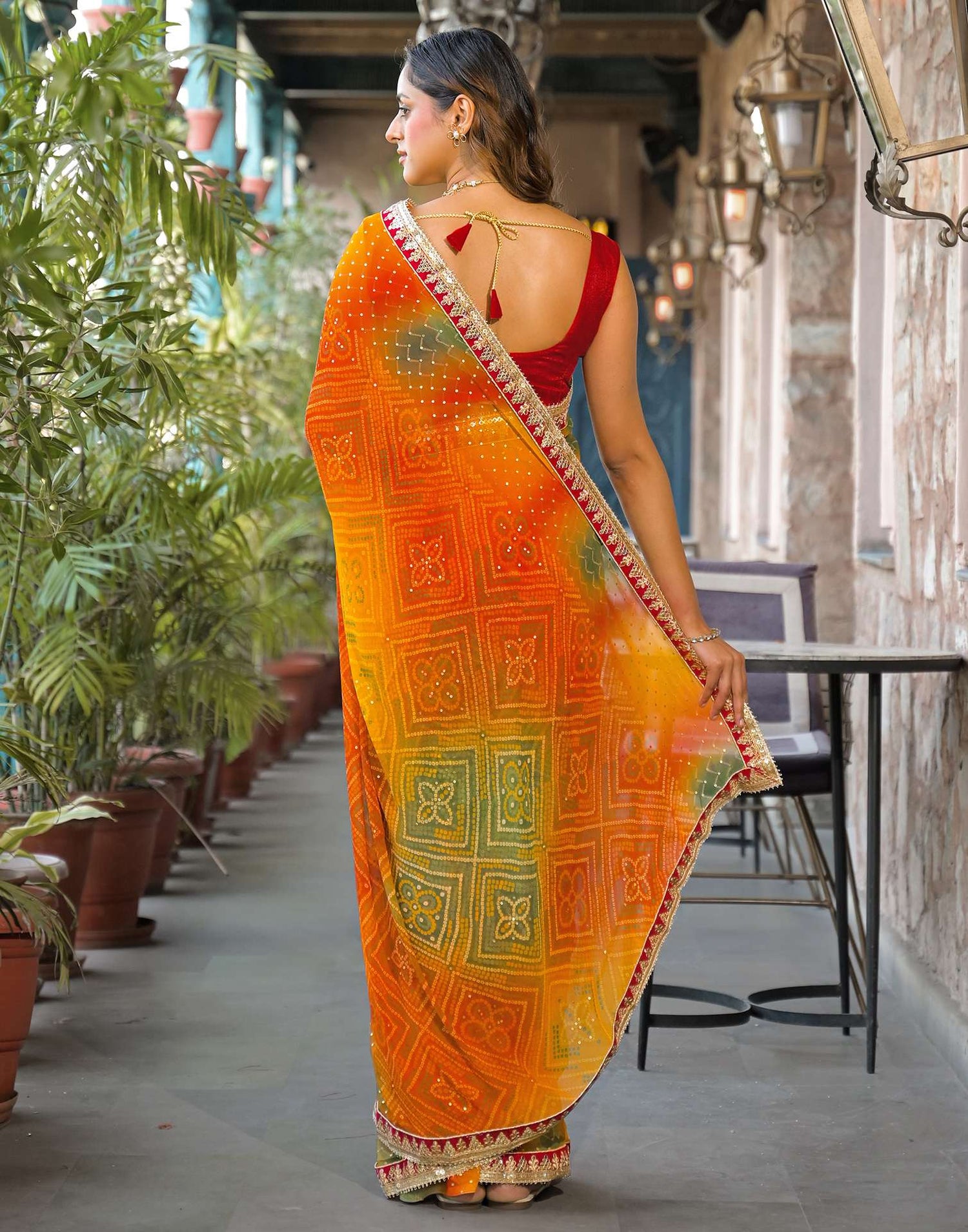 Orange Georgette Bandhani Printed Lace Saree