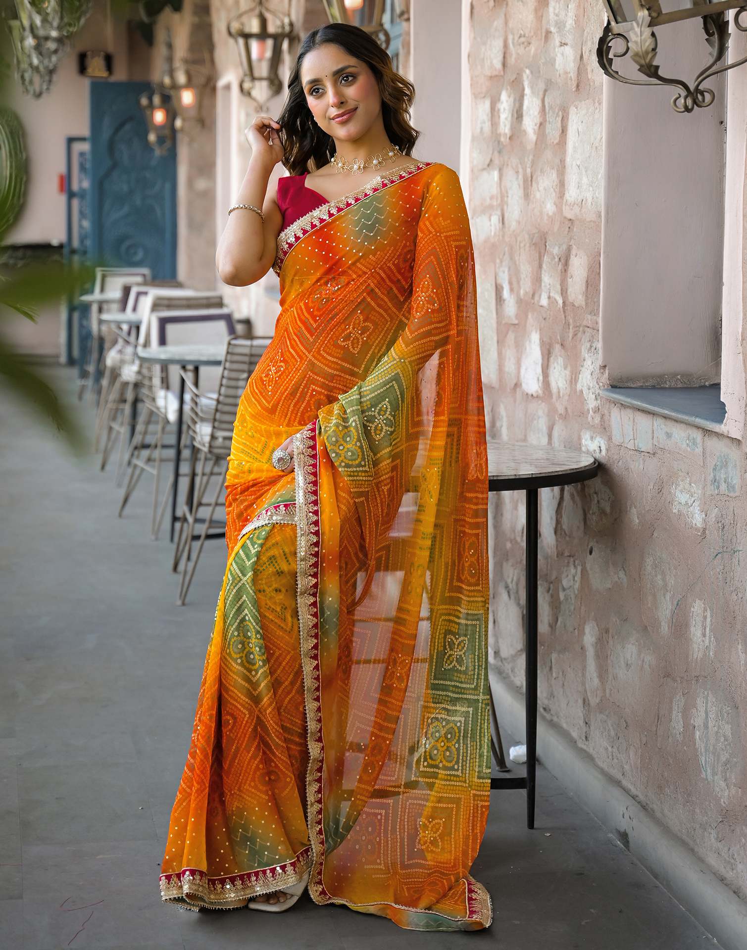 Orange Georgette Bandhani Printed Lace Saree