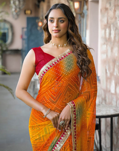 Orange Georgette Bandhani Printed Lace Saree