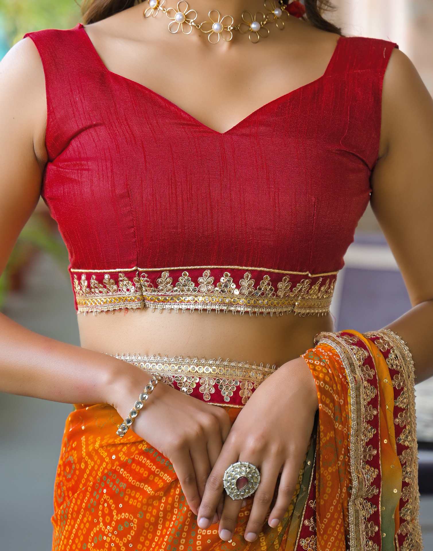 Orange Georgette Bandhani Printed Lace Saree