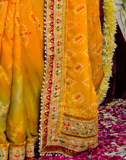 Yellow Chiffon Bandhani Printed Lace Saree