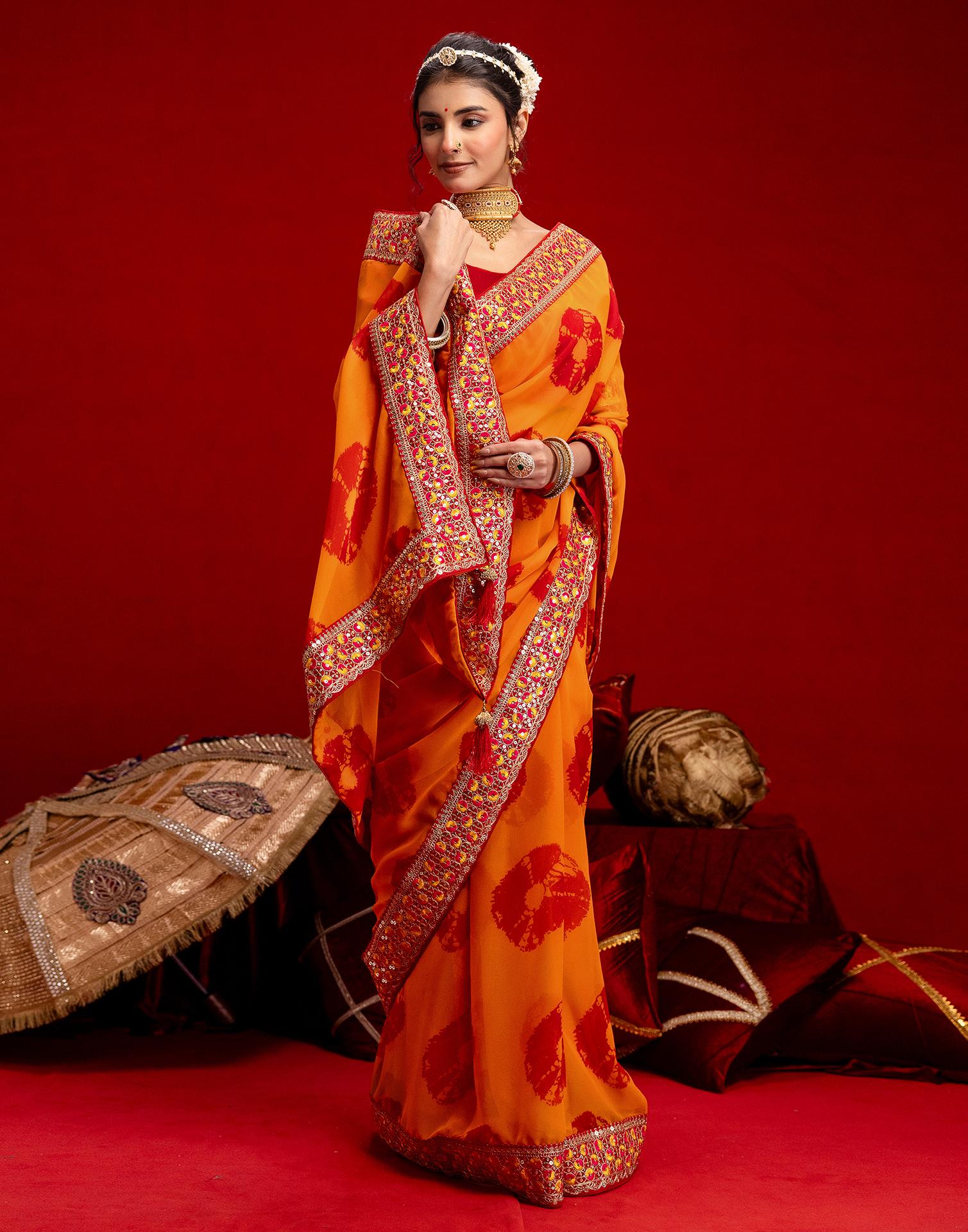 Orange Georgette Bandhani Printed Lace Saree