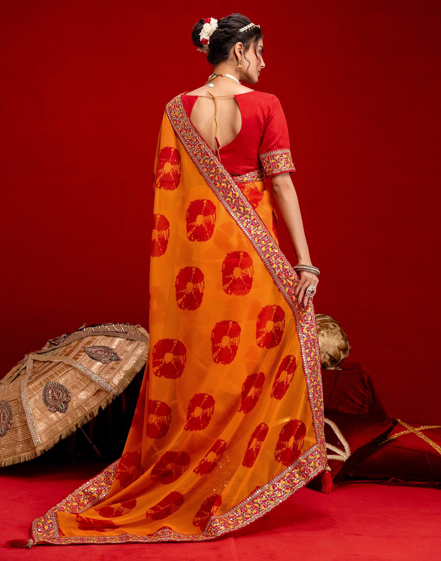 Orange Georgette Bandhani Printed Lace Saree