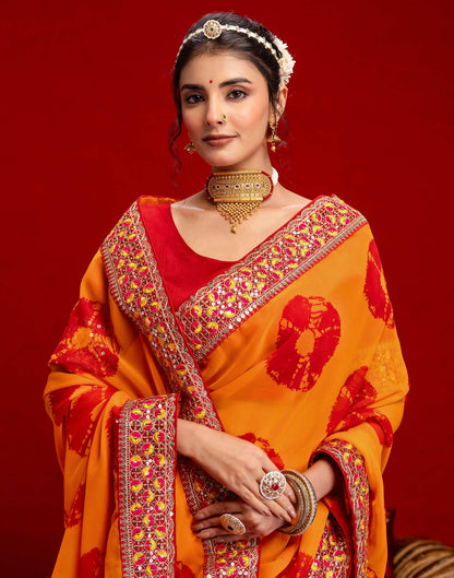 Orange Georgette Bandhani Printed Lace Saree