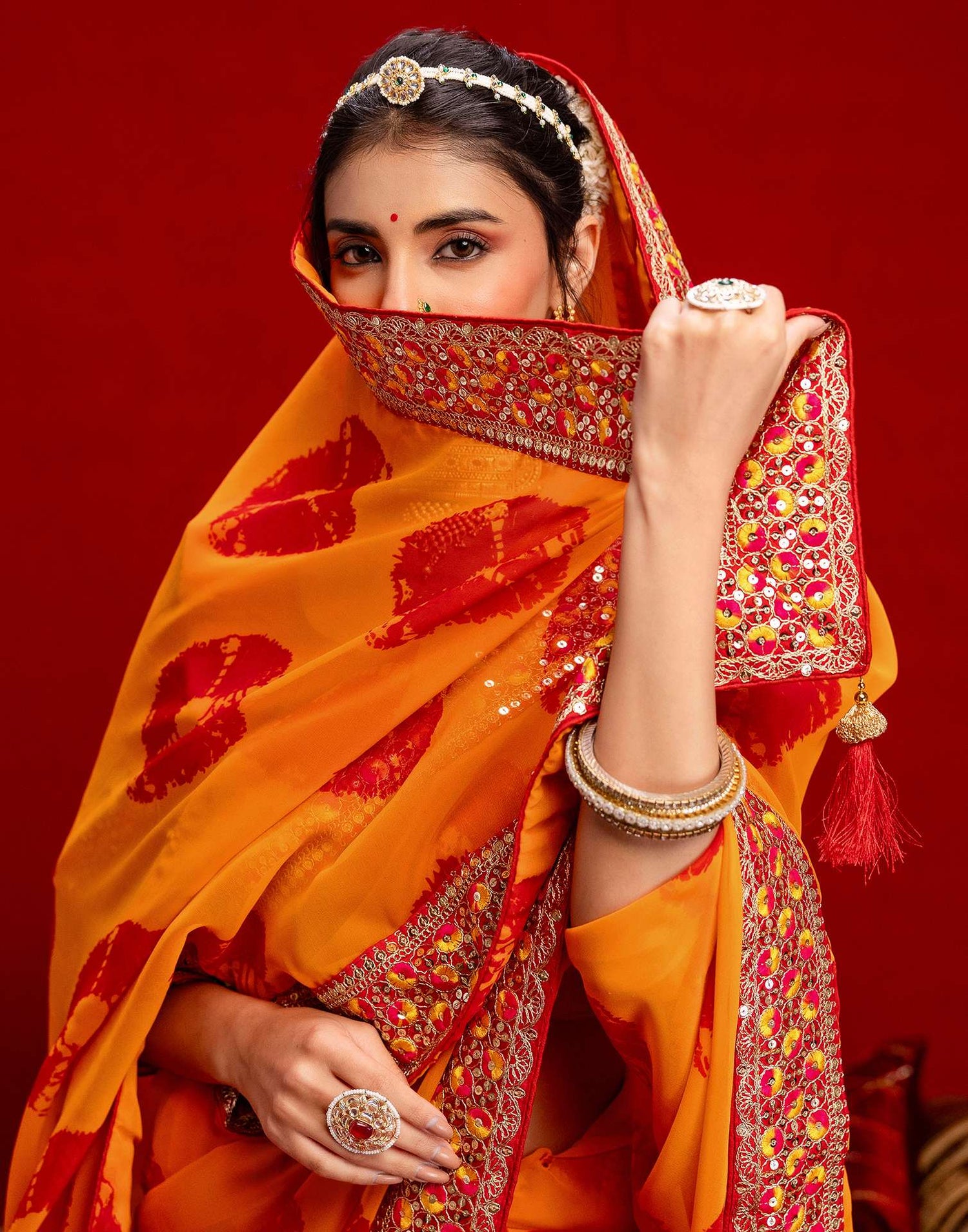 Orange Georgette Bandhani Printed Lace Saree
