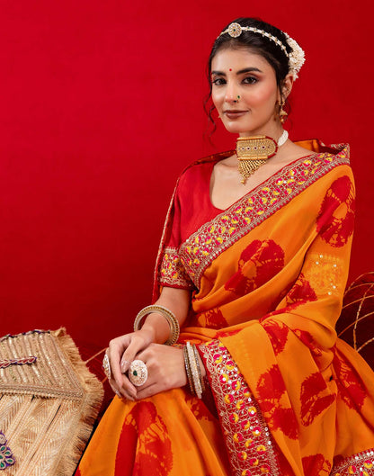 Orange Georgette Bandhani Printed Lace Saree