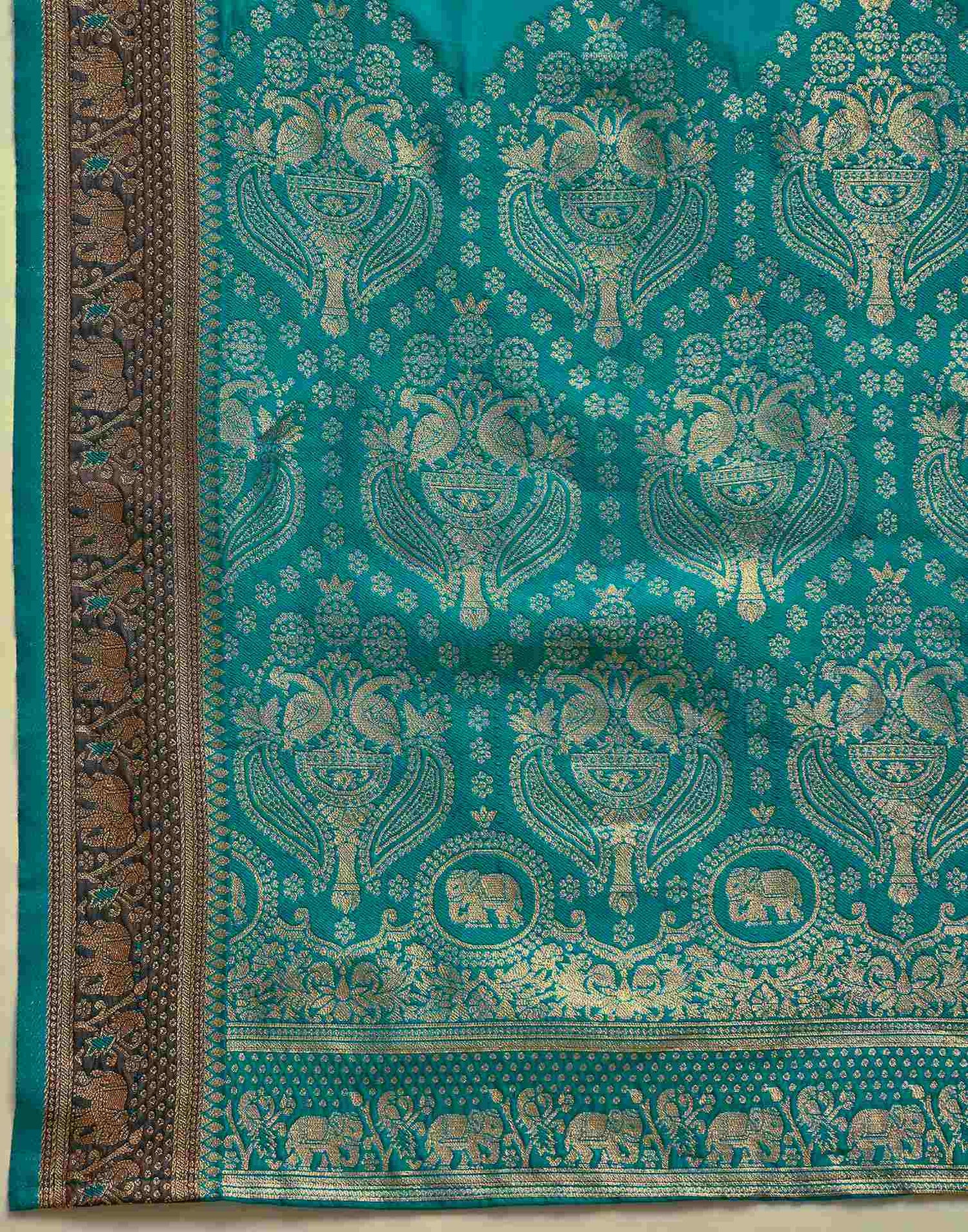 Teal Green Silk Woven Saree