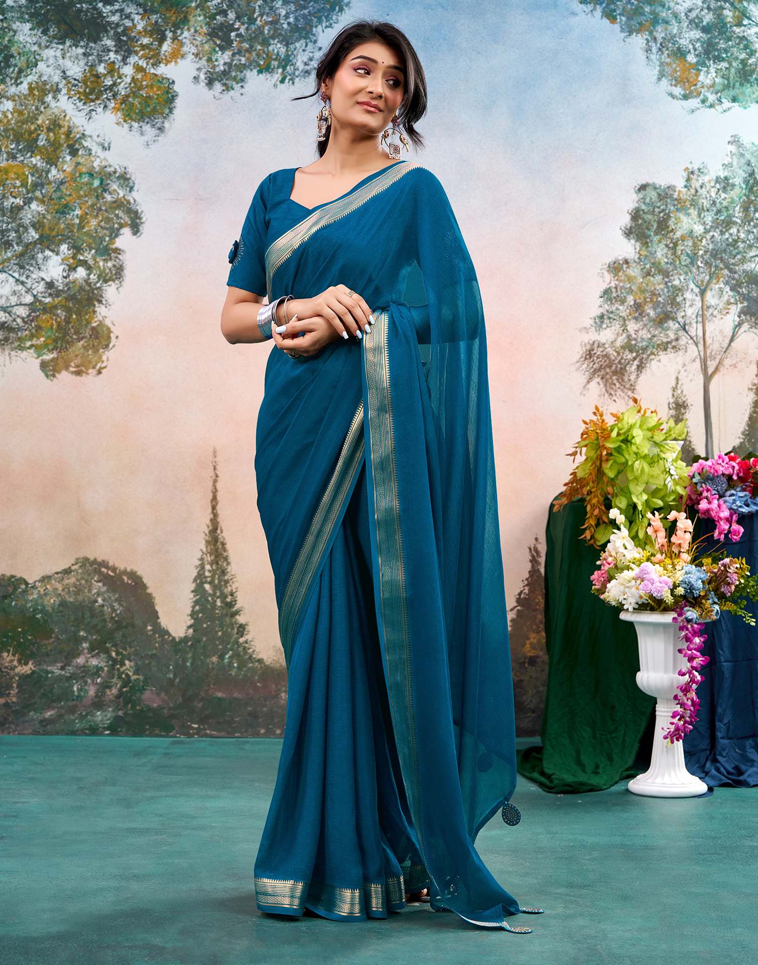 Peacock Blue Chiffon Woven Border Saree