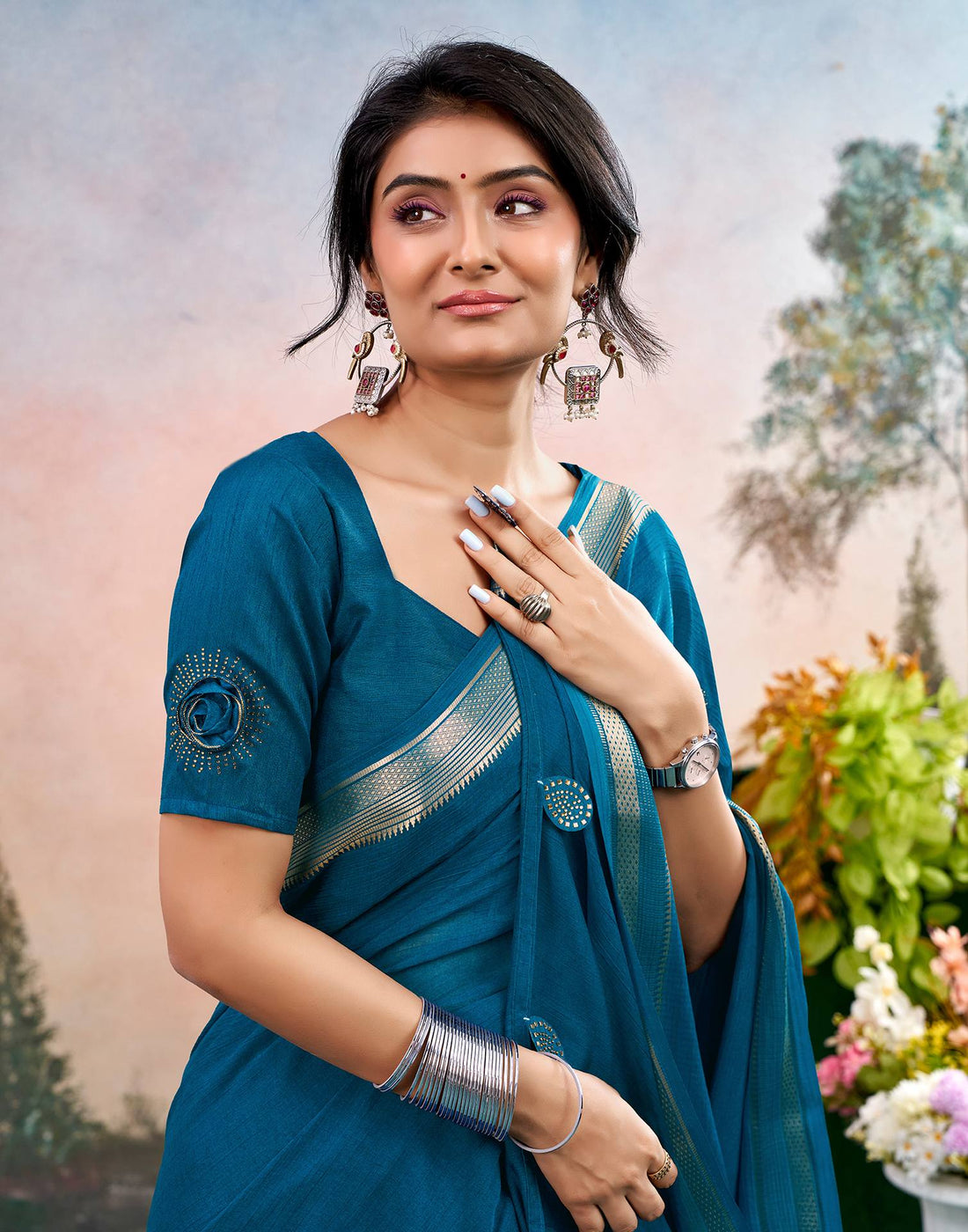 Peacock Blue Chiffon Woven Border Saree