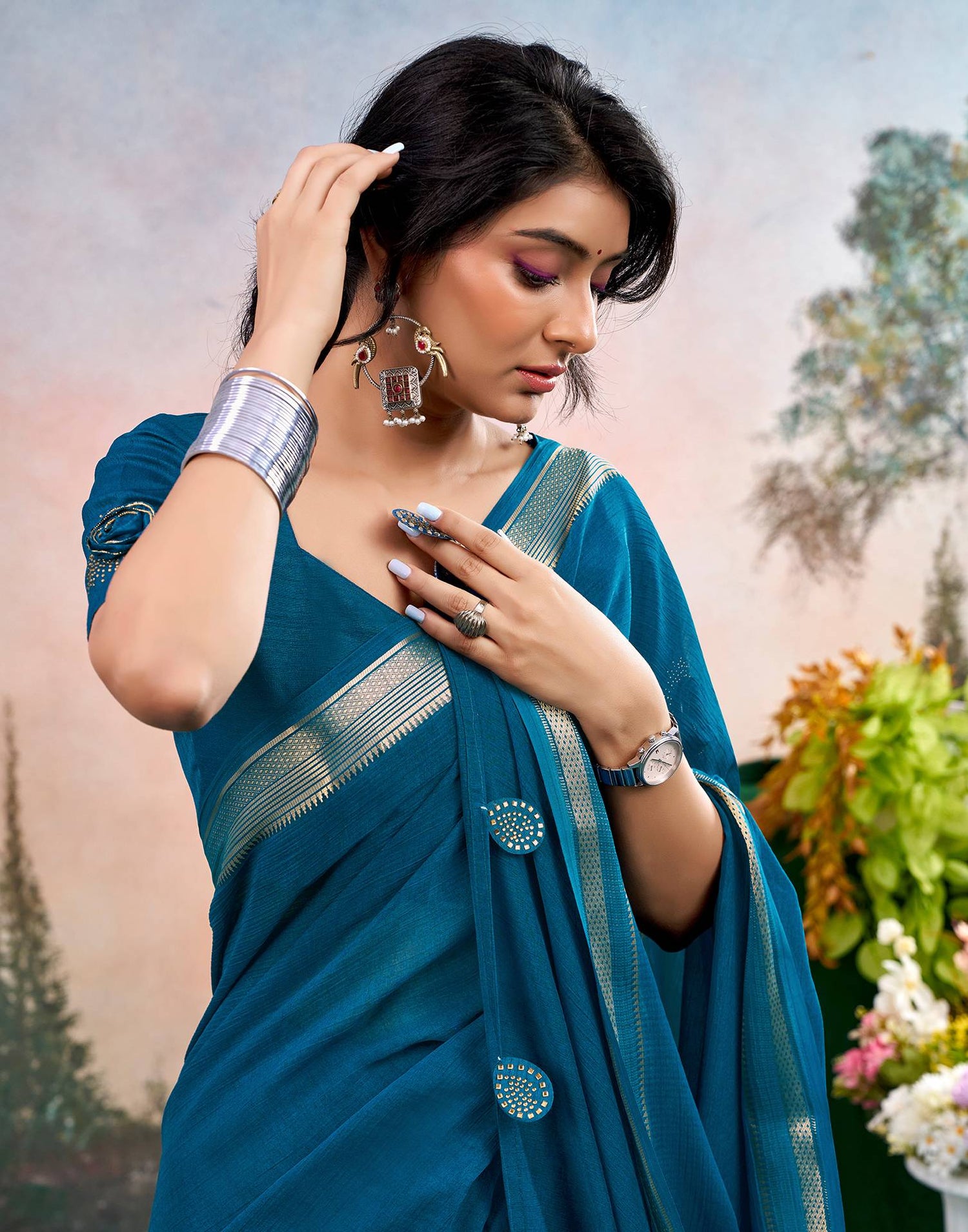 Peacock Blue Chiffon Woven Border Saree