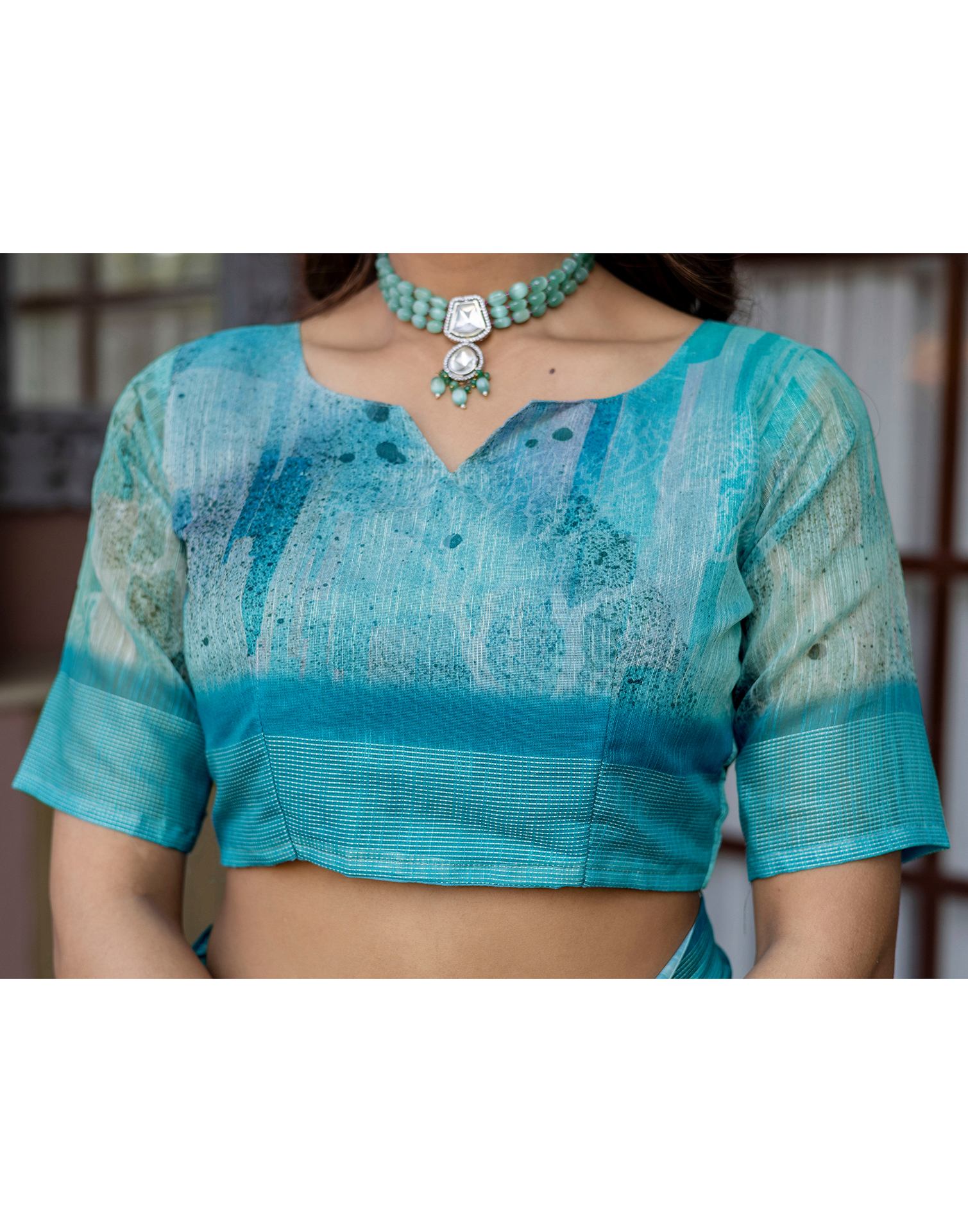 Turquoise Linen Printed Saree