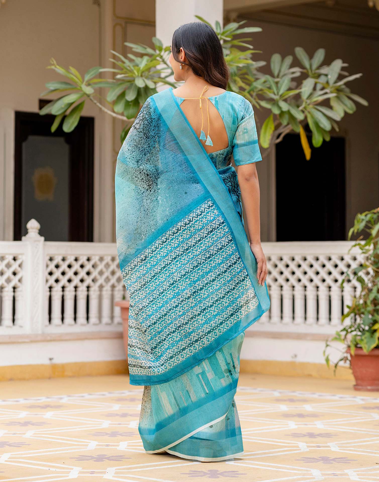 Turquoise Linen Printed Saree