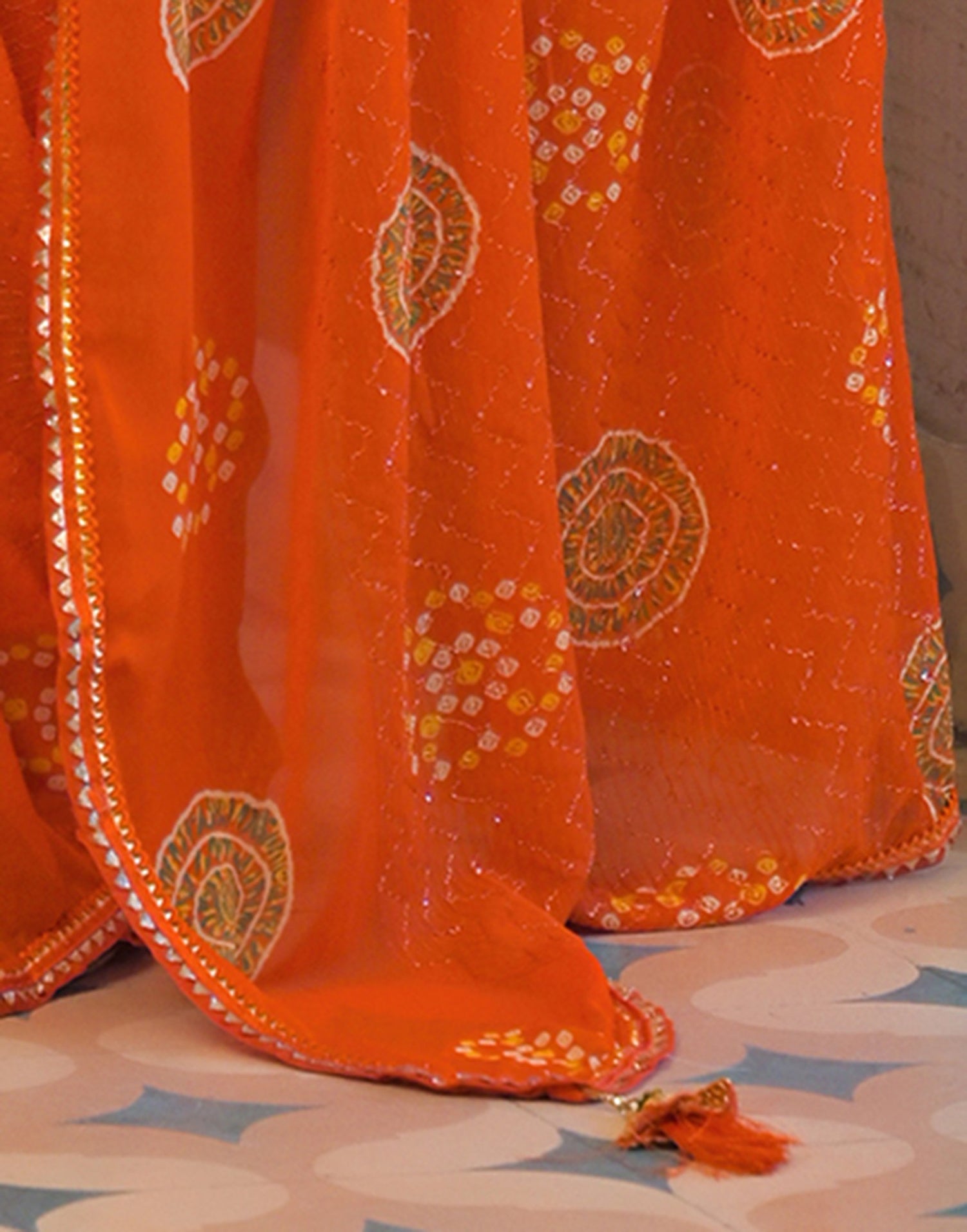 Orange Georgette Bandhani Printed Lace Saree