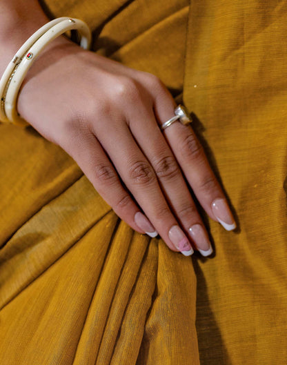Yellow Chanderi Cotton Tassels Plain Saree