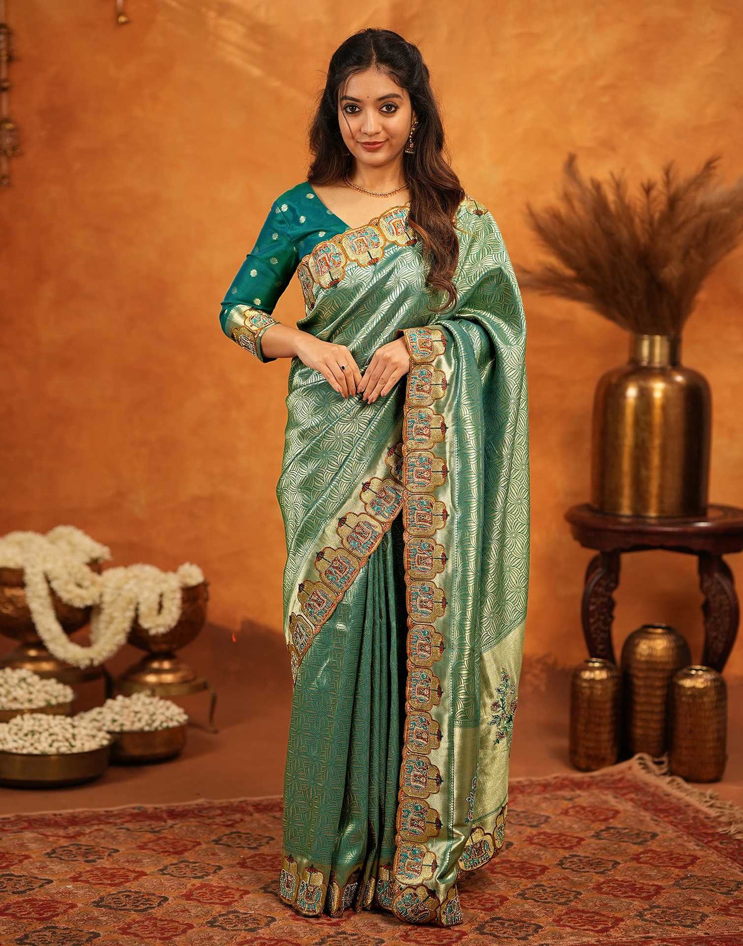 Teal Green Silk Woven Embroidery Stone Work Embellished Saree