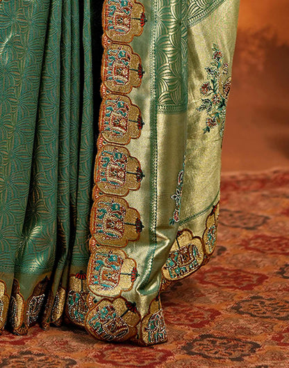 Teal Green Silk Woven Embroidery Stone Work Embellished Saree