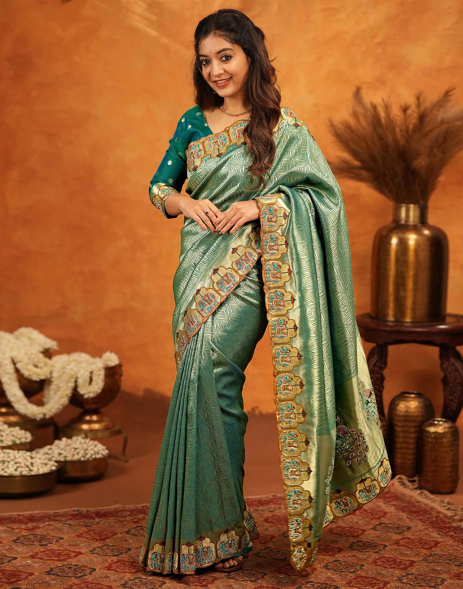 Teal Green Silk Woven Embroidery Stone Work Embellished Saree