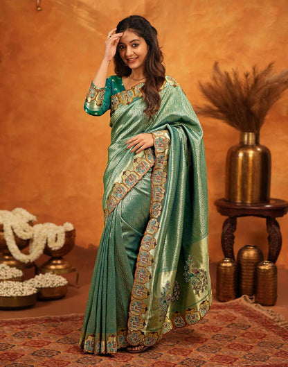 Teal Green Silk Woven Embroidery Stone Work Embellished Saree