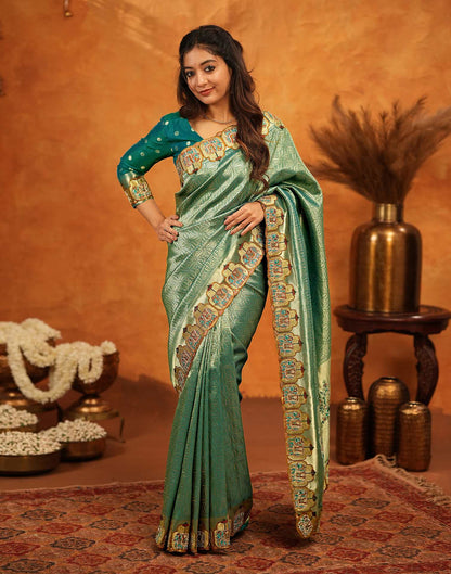 Teal Green Silk Woven Embroidery Stone Work Embellished Saree