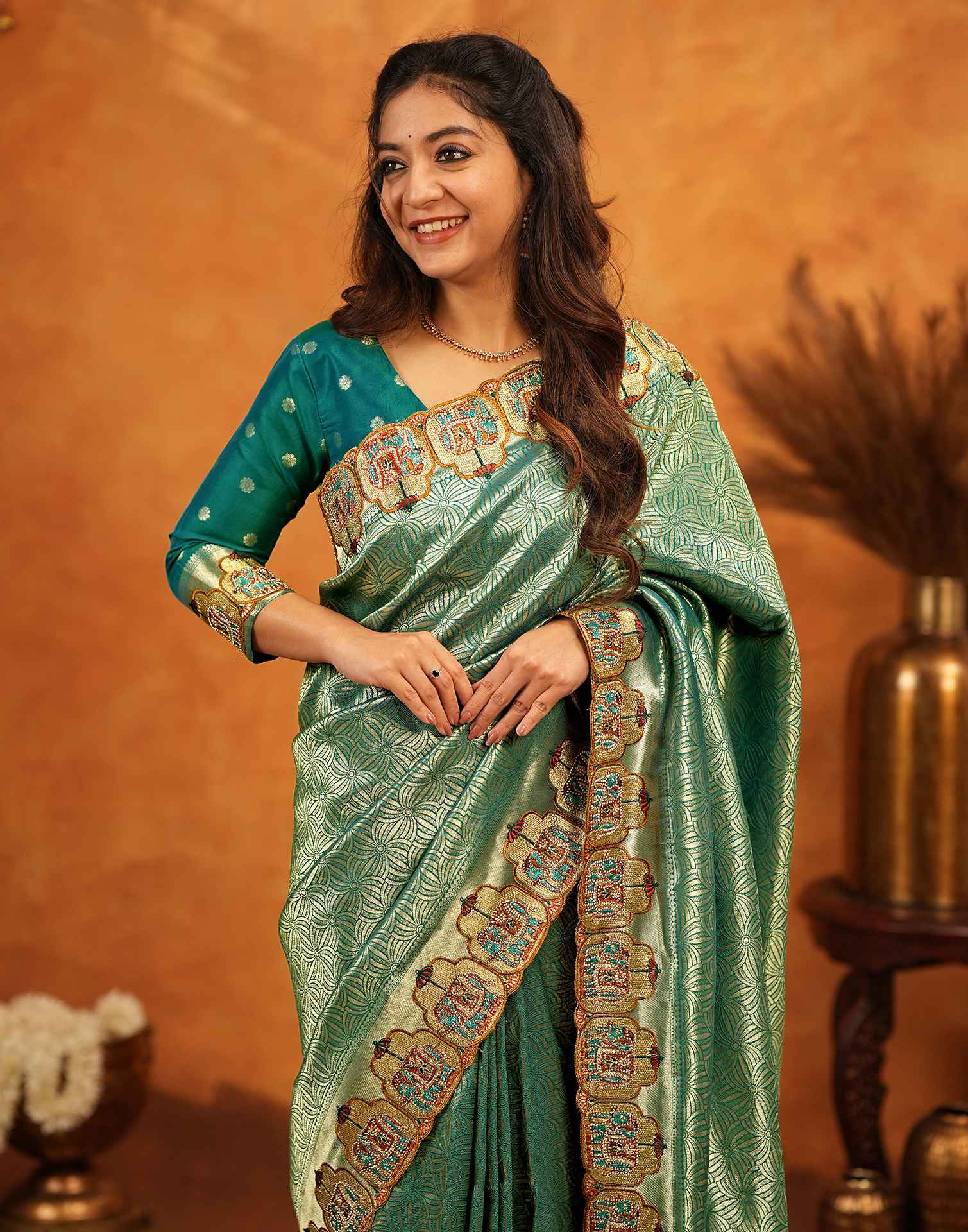 Teal Green Silk Woven Embroidery Stone Work Embellished Saree
