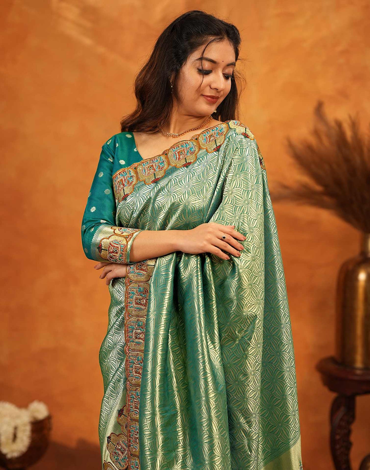 Teal Green Silk Woven Embroidery Stone Work Embellished Saree